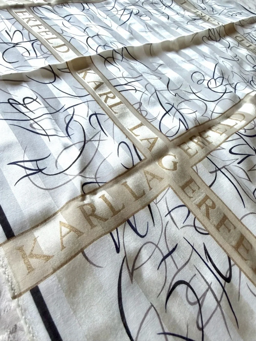 Karl Lagerfeld White Scarf with Black Script and Gold Bands